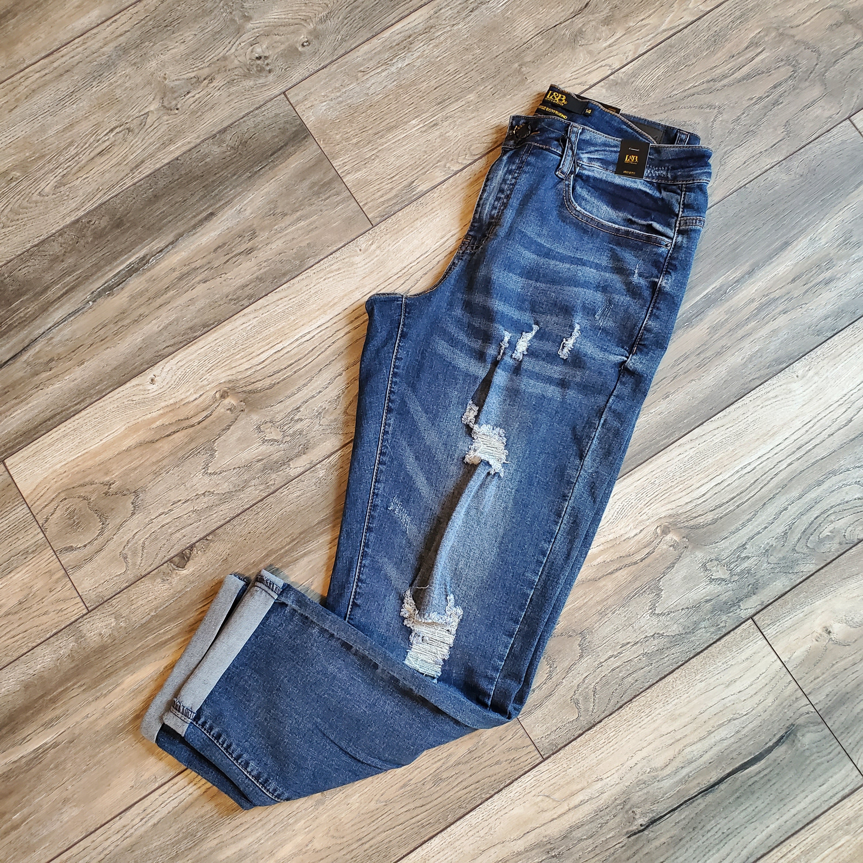 + Mid Rise Distressed Skinny Jeans